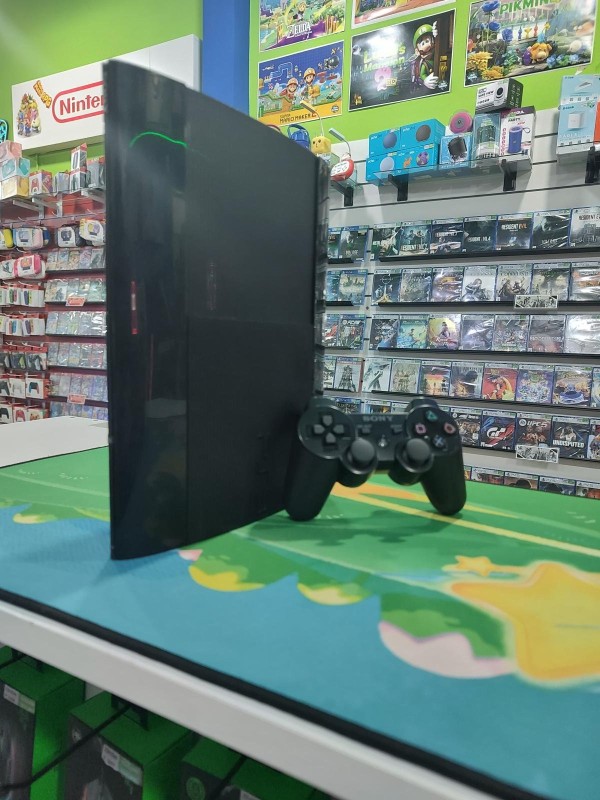 USADA Consola PS3 Super Slim 500 GB + Joystick + 60 Juegos